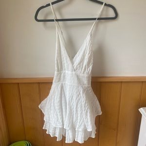 Boutique white romper, never worn